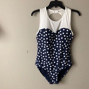 Navy blue polka dot open back one piece.Worn once